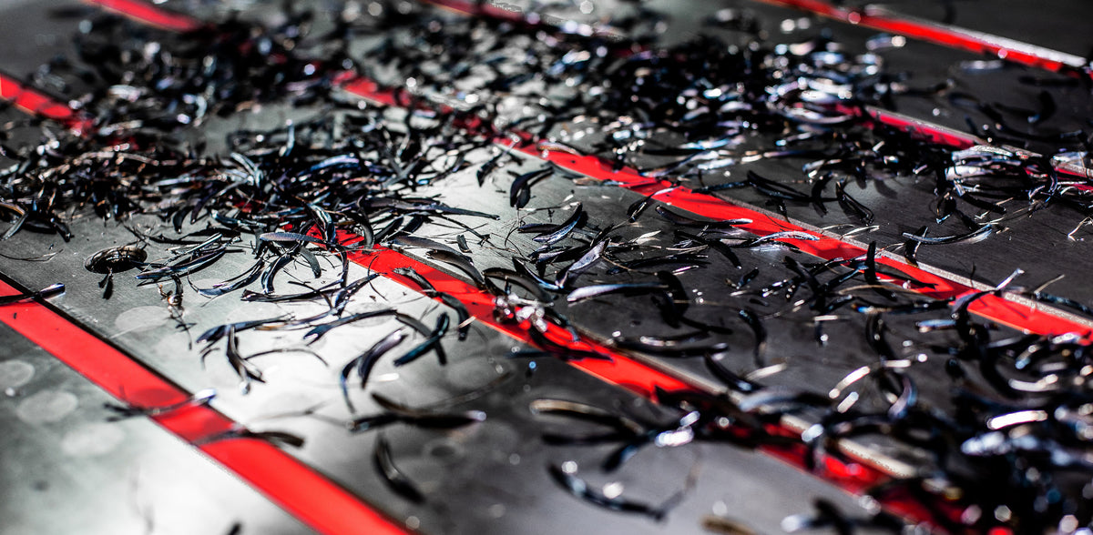 Swarf from milling on red t slot covers